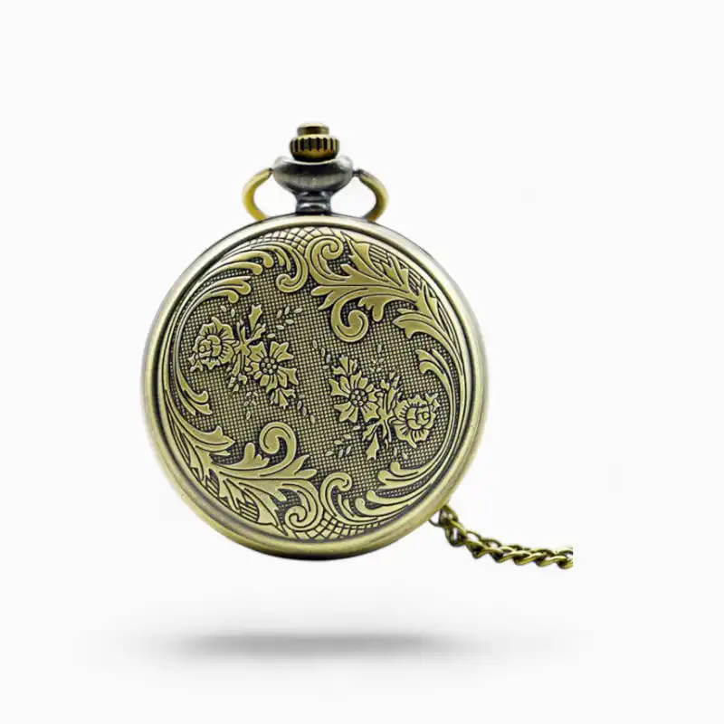 Montre à Gousset classique avec chaîne, style vintage, motif floral gravé en relief, inspirée des Caraïbes.