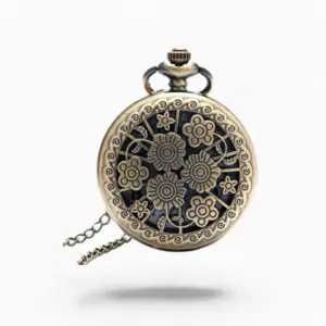 Montre à gousset vintage avec motif de fleurs gravées sur fond noir.
