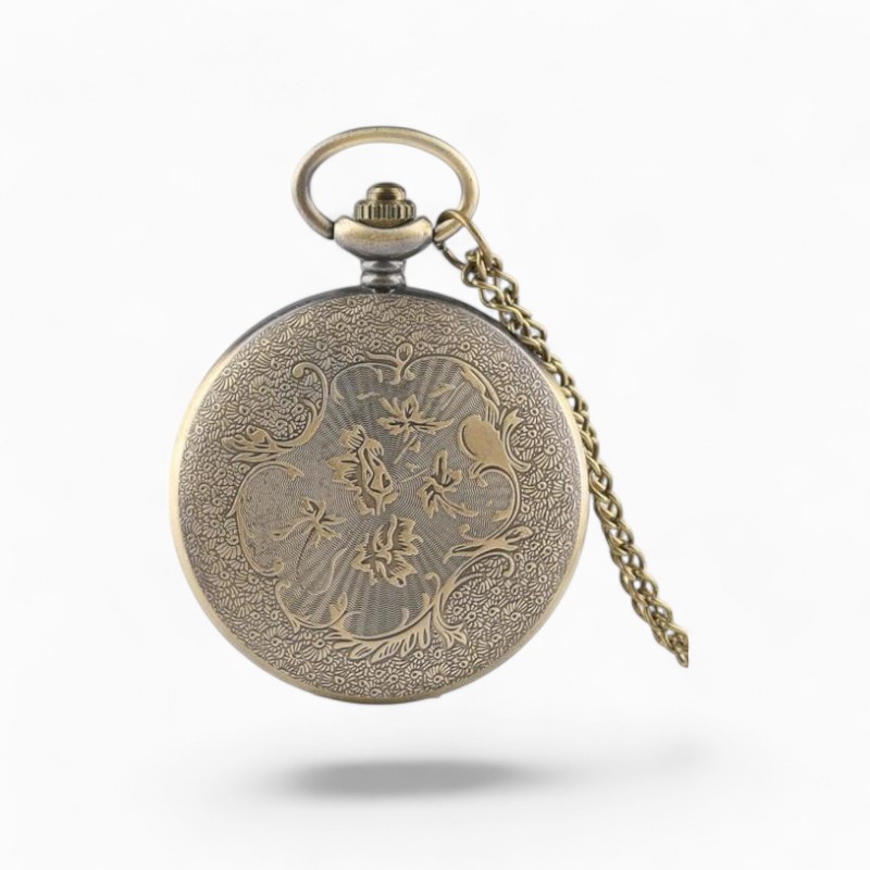 Montre à gousset vintage avec gravure raffinée de chef indien et chaîne en métal doré.