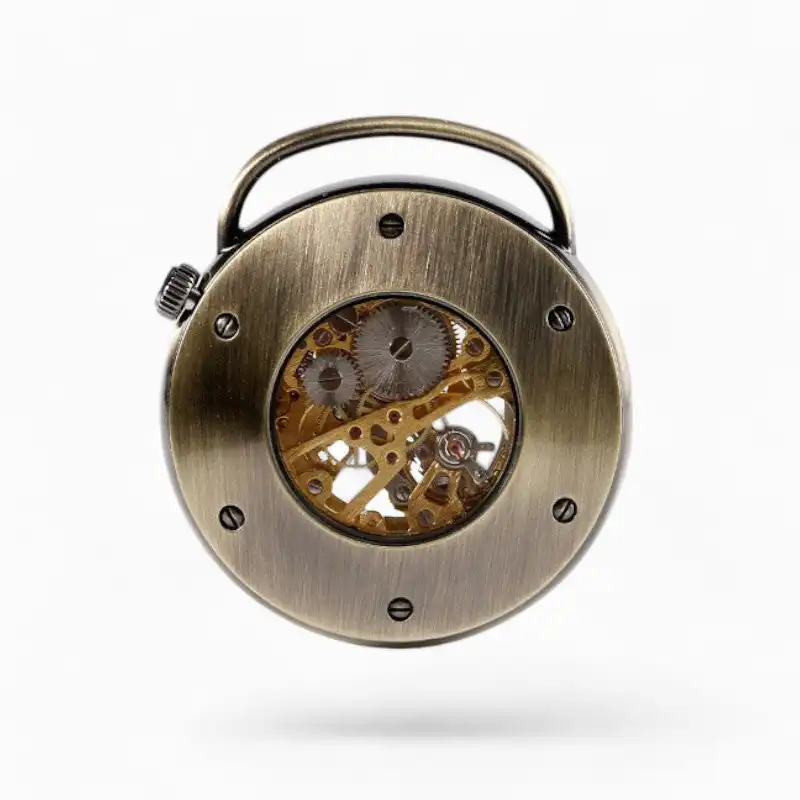 Montre à Gousset Mécanique Garde-Temps vintage avec un cadran ouvert affichant les rouages internes et boîtier en métal brossé.
