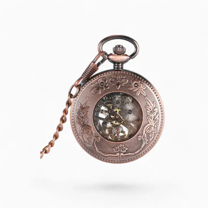 Montre à gousset mécanique serpentée vintage avec chaîne, en bronze, gravures florales et vue sur le mécanisme interne.