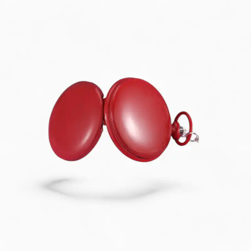 Montre à gousset colorée rouge avec couvercle ouvert, présentée sur fond uni.
